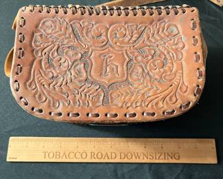 C62 - $30. Hand Tooled Leather Purse. "H" on the top.