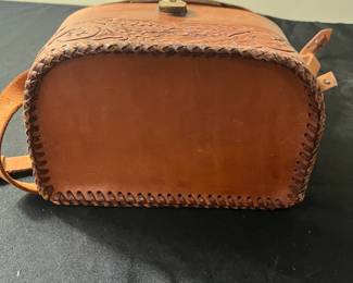 C62 - $30. Hand Tooled Leather Purse. "H" on the top.