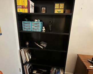 C44 - $50. Large Black Bookcase with 4 adjustable shelves. Measures 37" wide x 12" deep x 72" tall. Pressed wood but good quality and in great shape!