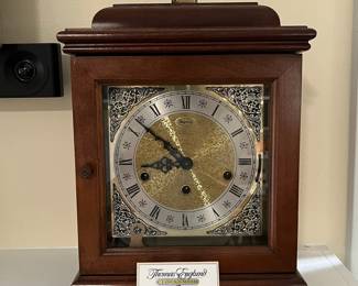 C26 - $50. Ridgeway Mantle Clock. Measures 10" wide x 6.5" deep x 14" tall. 