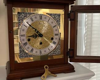 C26 - $50. Ridgeway Mantle Clock. Measures 10" wide x 6.5" deep x 14" tall. 