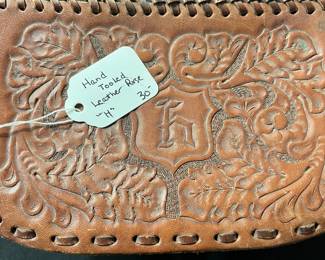 C62 - $30. Hand Tooled Leather Purse. "H" on the top.