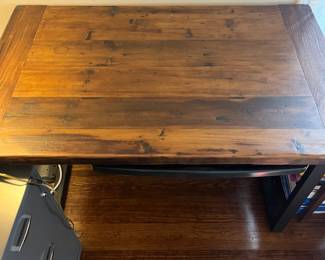 C74 - $125. Kensington Desk. Solid Wood Top With Metal Legs. Measures 48" w x 30 d x 30.5" tall.
