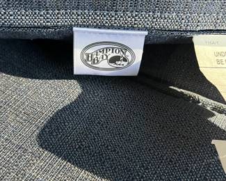 C91 - $100. Hampton Bay Loveseat. Measures 56" wide x 36" tall x 34" deep. 