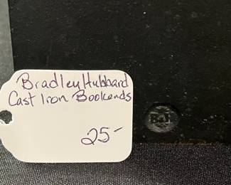 C53 - $25. Bradley Hubbard Cast Iron Bookends. Measures 3.5" x 5.25" tall.