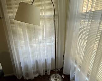 C22 - $30 Each. 2 Available. Stainless Colored Floor Lamps. Shades are in good condition. Height is adjustable from 56" - 65". Possibly from IKEA. 