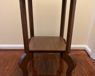 C19 - $50. Solid Oak Side Table. Measures 19" x 15" x 25.25" tall. 