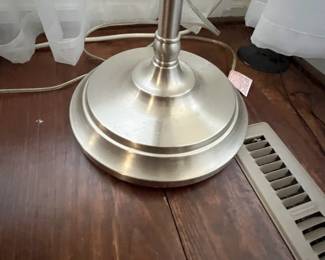 C22 - $30 Each. 2 Available. Stainless Colored Floor Lamps. Shades are in good condition. Height is adjustable from 56" - 65". Possibly from IKEA. 