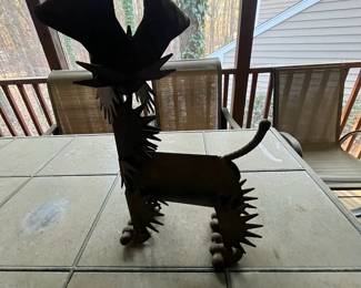 C94 - $25. Metal Yard Art Dog. Measures 15" x 6" x 18.5" tall. 