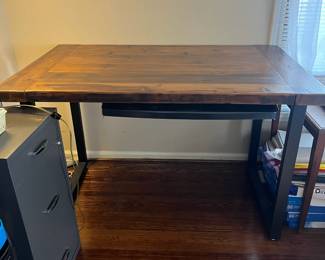 C74 - $125. Kensington Desk. Solid Wood Top With Metal Legs. Measures 48" w x 30 d x 30.5" tall.