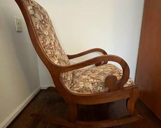 C41 - $50. Upholstered Wooden Rocker. Measures 22" wide x 39" tall. Rocks very nice - feels like the seat has springs that need some more covering. 