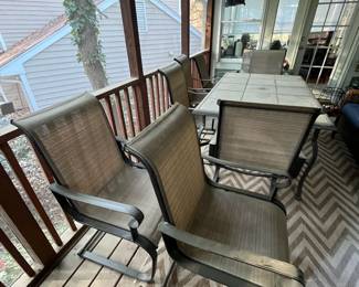 C93 - $150. Patio Table & Chairs. Needs a good bath but very sturdy! Table Measures 64.5" x 40" x 29.25" tall. Chairs are 22.5" wide x 39.5"tall. 