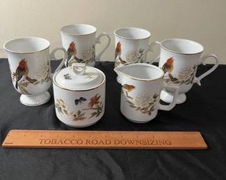 C52 - $20. Chinese Garden By Stafford. Set includes 4 cups, sugar and creamer.