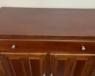 C17 - $125. *Tall* Server Cabinet. Measures 44" wide x 20" deep x 44.25" tall. Each drop leaf can add an extra 11.75". Drawer slides easily. Panel back needs reattached in a few places. 