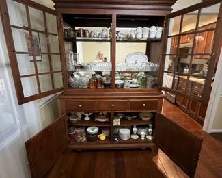 C15 - $95. Lighted China Display Cabinet. No name that we can find. Back paneling needs reattached and one latch needs a screw. Drawers all slide and doors open & close! Measures 57" wide x 82" tall x 17" deep bottom x 13" deep top. 