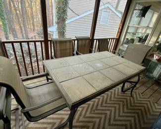 C93 - $150. Patio Table & Chairs. Needs a good bath but very sturdy! Table Measures 64.5" x 40" x 29.25" tall. Chairs are 22.5" wide x 39.5"tall. 