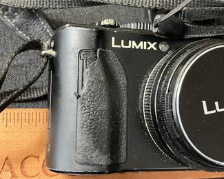 C67 - $60. Vintage Lumix Panasonic DMC-LX5 Digital Camera. W/ Live View Finder, Battery and Charger. Tested and Works.