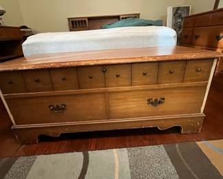 C39 - $40. Well Loved Lane Cedar Chest. Measures 44" wide x 19" tall x 17" deep. Outside has some veneer missing and significant use on the frame. Still very sturdy and useable!