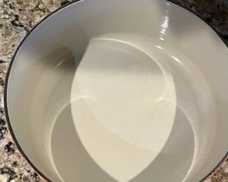 C9 - $125. Le Creuset #24 Dutch Oven Flame Orange. Small chip/ scratch on handle - otherwise in almost new condition. 