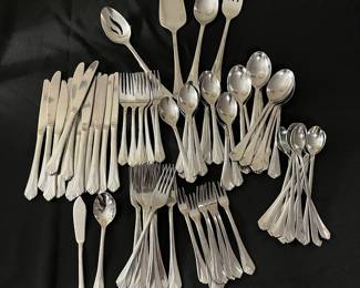 C13 - $75. Farberware 88 Pieces Stainless Flatware. 