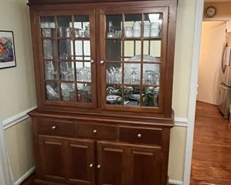 C15 - $95. Lighted China Display Cabinet. No name that we can find. Back paneling needs reattached and one latch needs a screw. Drawers all slide and doors open & close! Measures 57" wide x 82" tall x 17" deep bottom x 13" deep top. 
