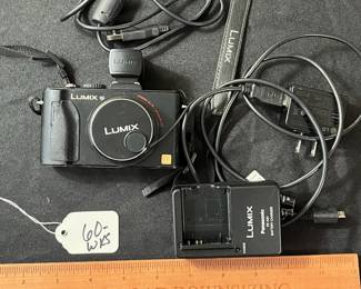 C67 - $60. Vintage Lumix Panasonic DMC-LX5 Digital Camera. W/ Live View Finder, Battery and Charger. Tested and Works.