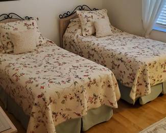 Bedroom suite. 2 twin beds including mattress, box springs and rails. Dresser, end table and wicker side chair.  All in like- new condition.