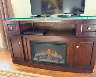 Twin Star Home glass top fireplace/tv stand