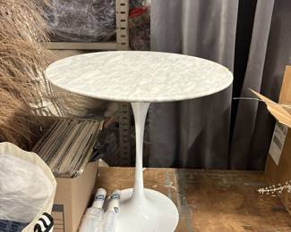 Marble topped tulip cocktail table