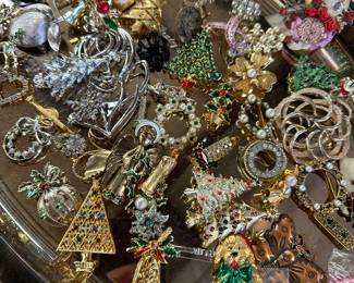 LOTS of jewelry! Trays of brooches! 