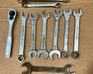 Assorted wrenches and a ratchet