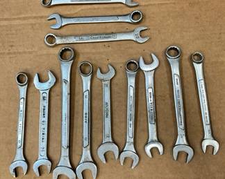 Assorted wrenches and a ratchet.