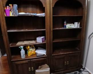 walnut library shelving with cabinets below