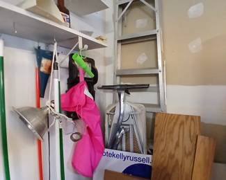 aluminum ladder, light, ironing board, misc