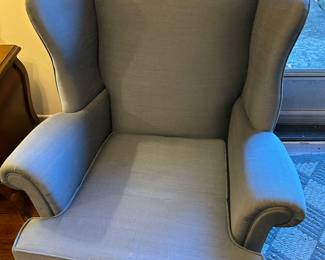 A PAIR OF WING BACK CHAIRS.