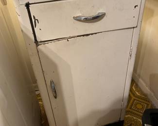 VINTAGE ENAMEL TOP STORAGE CABINET.