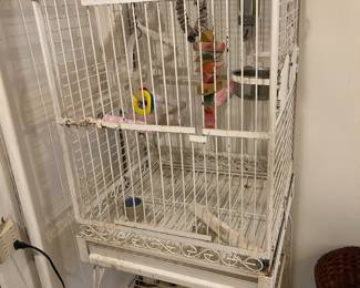 LARGE BIRD CAGE. SHE HAD A PARROT.