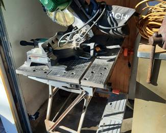 #57  Hitachi Compound Miter Saw w/Laser & Stand   $195