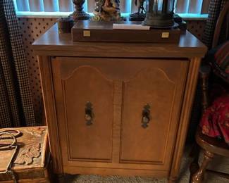 in cabinet sewing machine and filled with all the extras