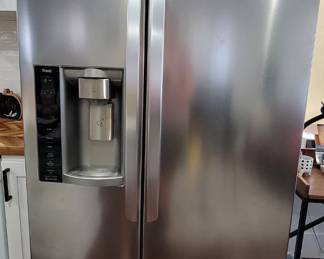 LG side by side fridge / freezer. Ice and water in the door