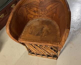 Unique engraved leather chair.
