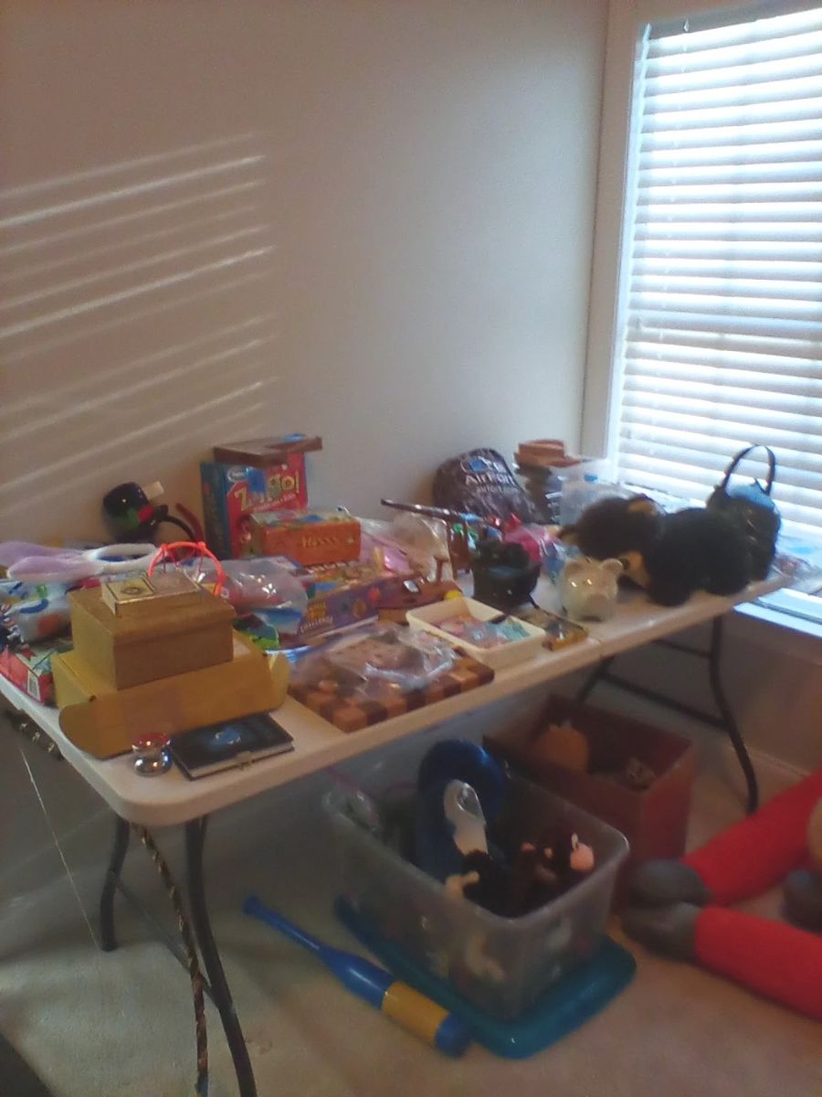 Children's games, puzzles, cards, books and stuffed animals.