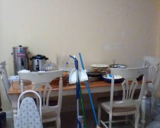 Farm style table with 6 chairs.  Household items.