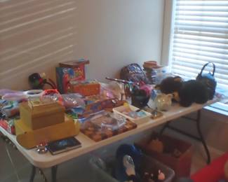 Children's games, puzzles, cards, books and stuffed animals.
