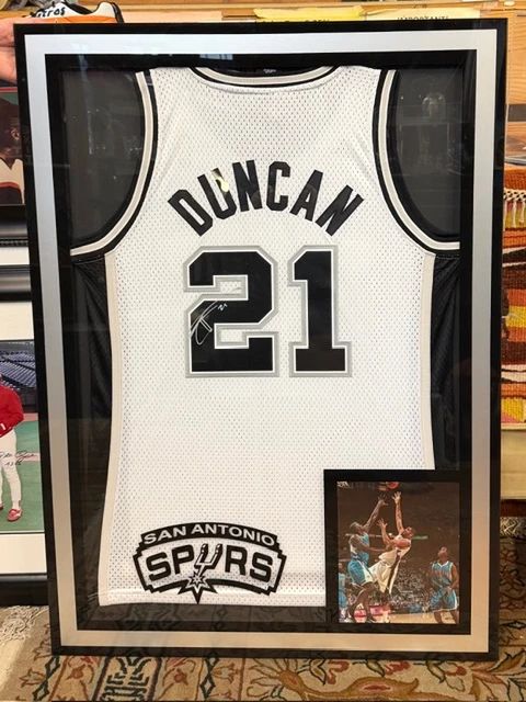 Tim Duncan signed, framed jersey.