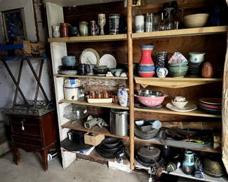 Pottery pieces, handmade. Pyrex, some fiesta plates, old cabinet, glassware, rice cooker, cast iron pans, skillets