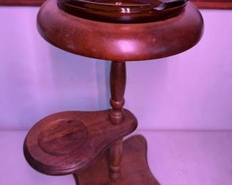 Walnut ashtray stand. HiBid link: https://modestlambestatesales.hibid.com/