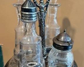 James W Tufts cruet condiment caddy. HiBid link: https://modestlambestatesales.hibid.com/