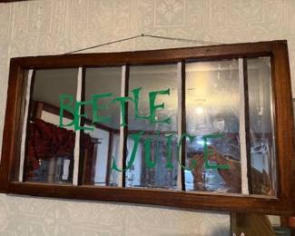 Handmade Bettle Juice mirror. HiBid link: https://modestlambestatesales.hibid.com/