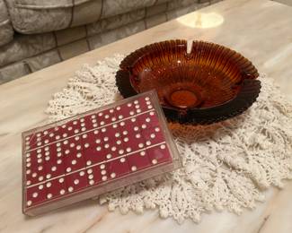 Vintage glass, marble top tables, Bakelite dominoes 